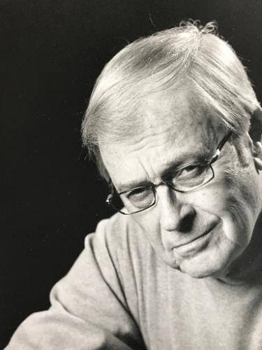 Black and white photograph of artist Don Kerr.